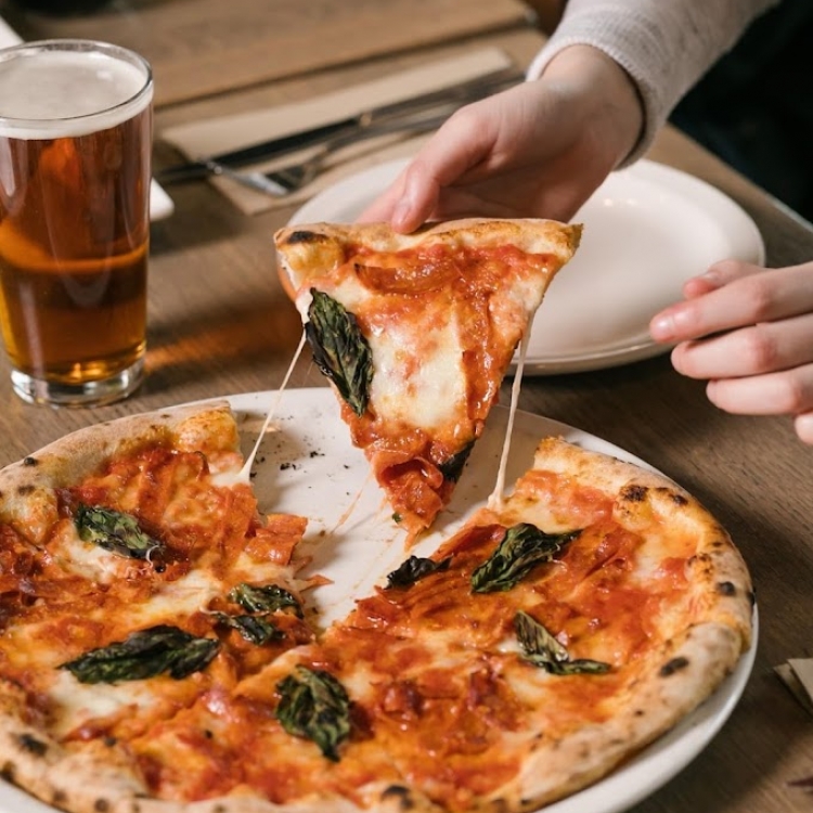 Famoso Neapolitan Pizzeria + Bar In Regina - Eastgate